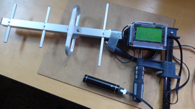 Tracking LoRa receiver antenna mounted on a vice
